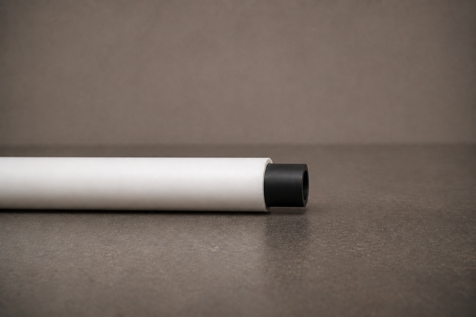 Clean FRPU tube end with approximately 10 millimetres of black PU inner tube exposed