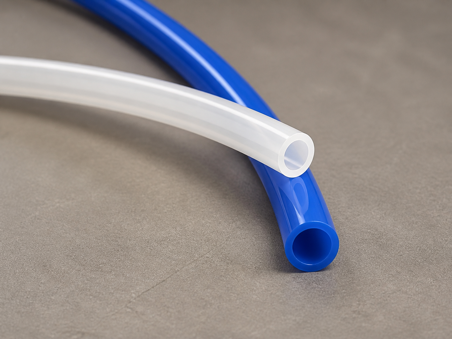 Macro view of natural white and blue HOLID PA6 nylon pneumatic tube cut ends